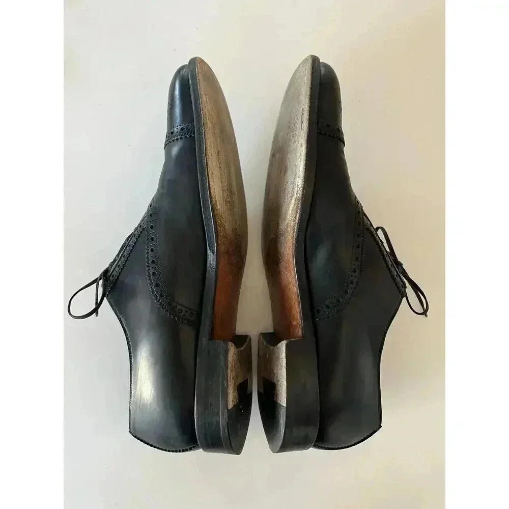 Salvatore Ferragamo Black Leather Wingtip Oxfords